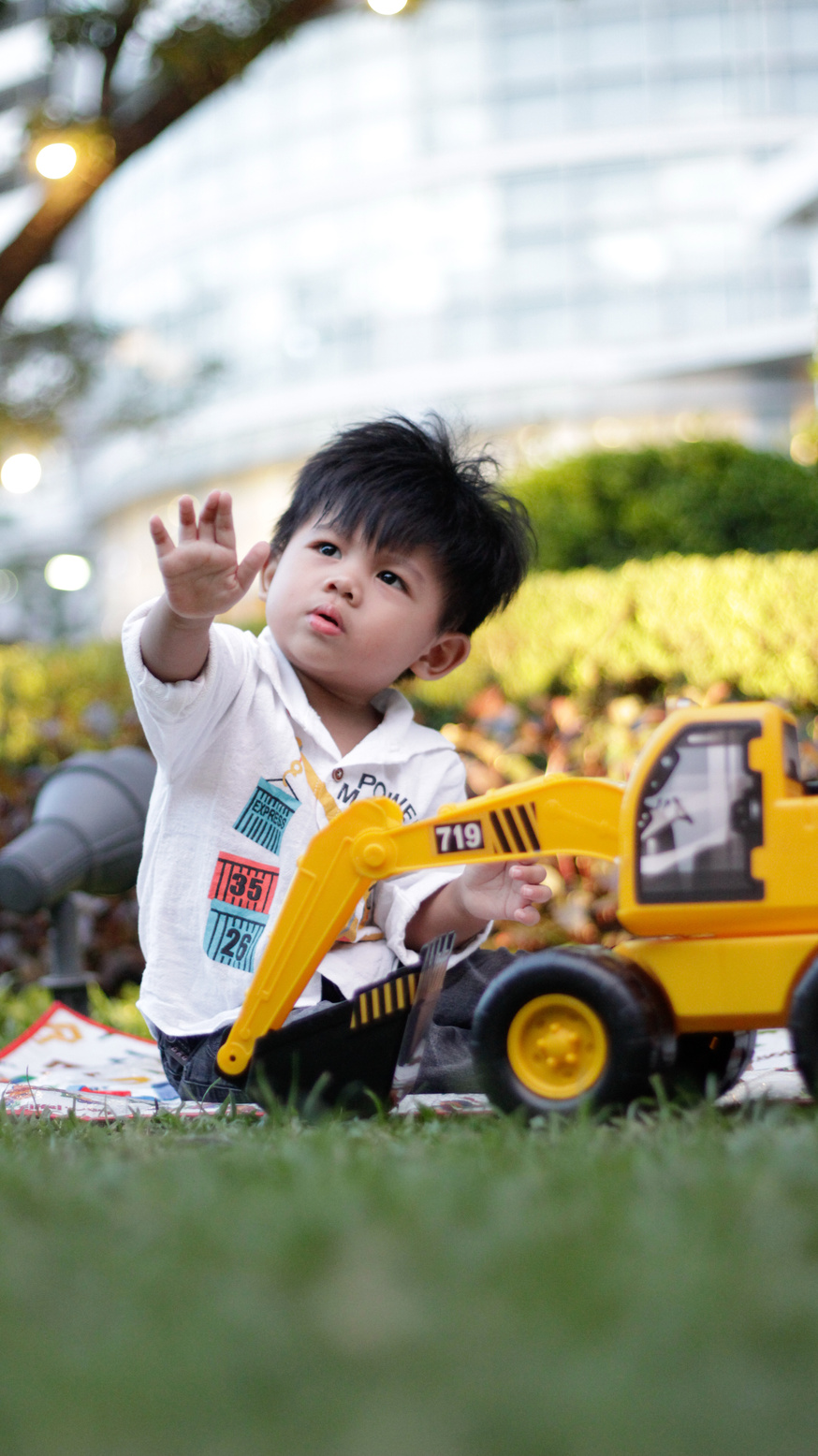 a boy with his arms up 