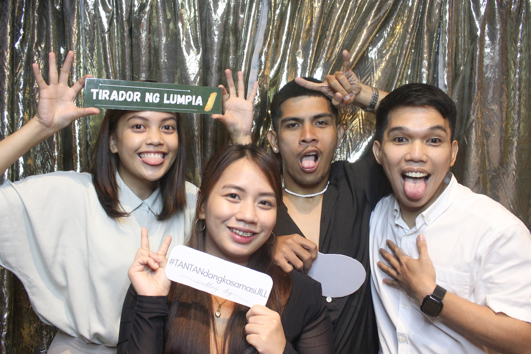 Picture of people posing on a photobooth